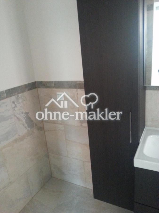 Badezimmer mit Schranksystem