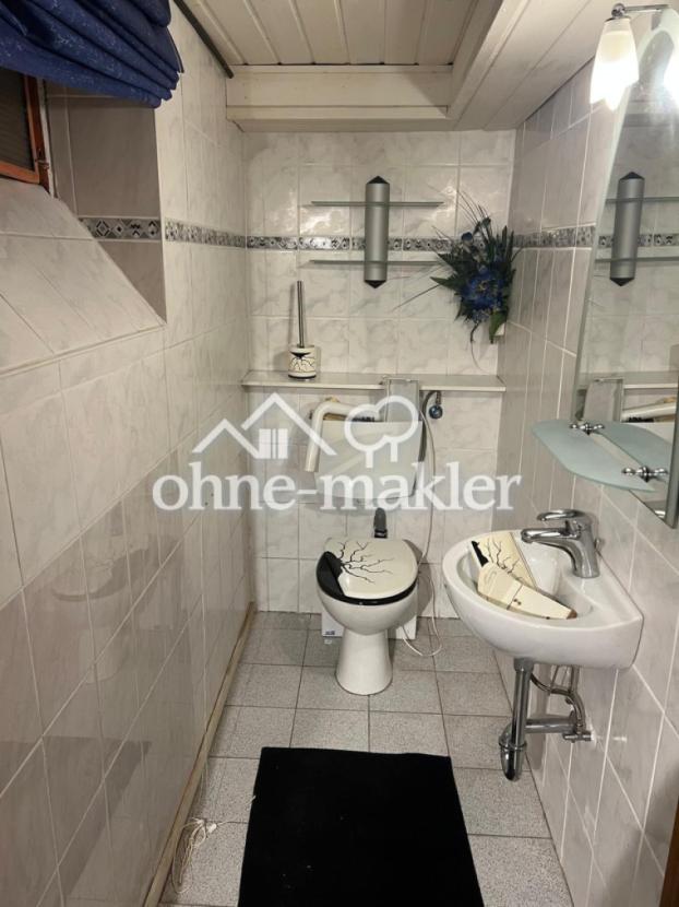 Zusatz-Toilette im Keller