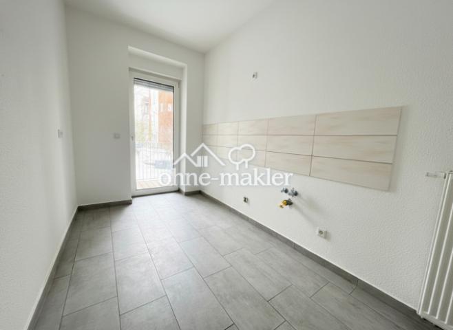 Küche mit Balkontür 