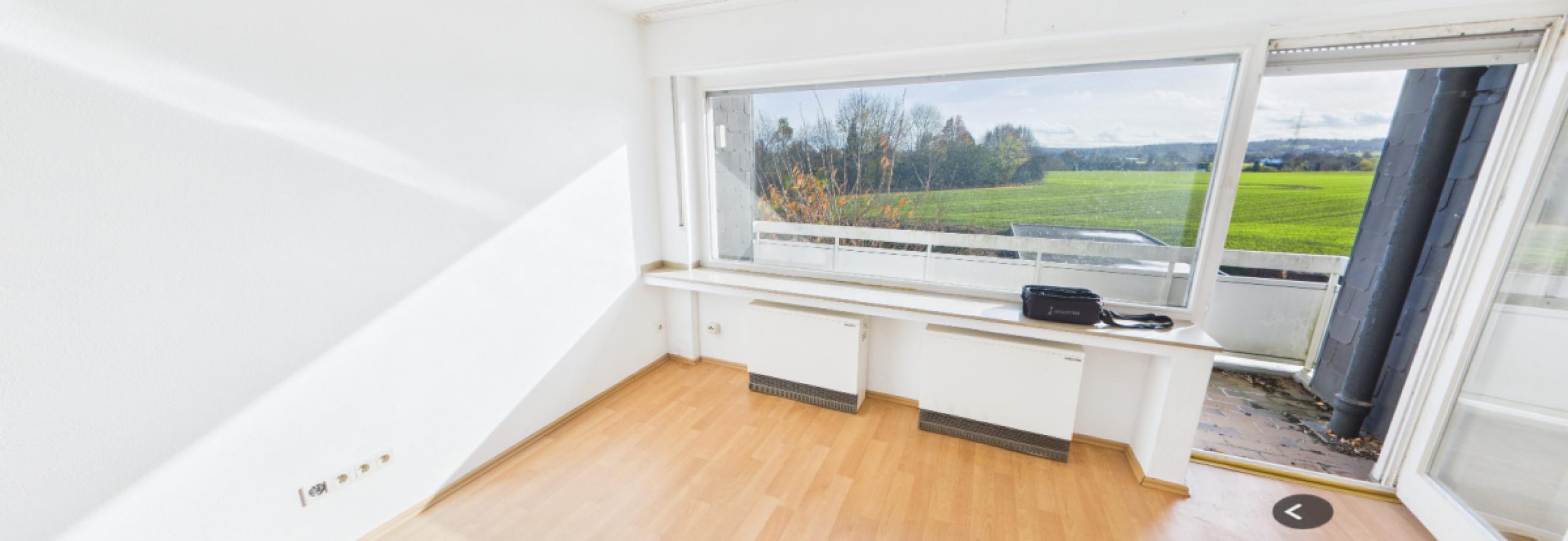 Wohnzimmer- Weyel Immobilien