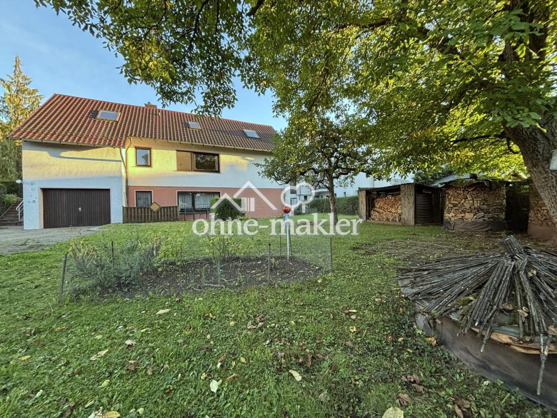 Hausansicht vom Garten im UG