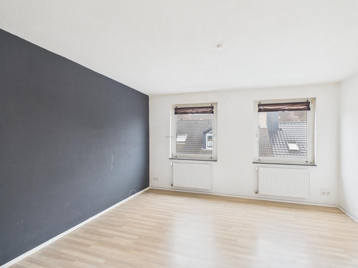 Wohnzimmer - Weyel Immobilien