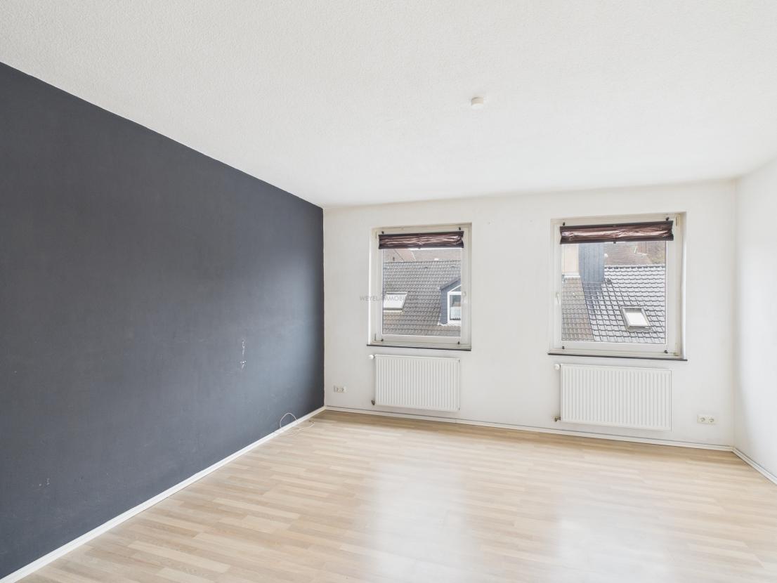 Wohnzimmer - Weyel Immobilien
