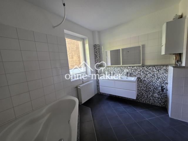 Badezimmer mit Waschmaschienen