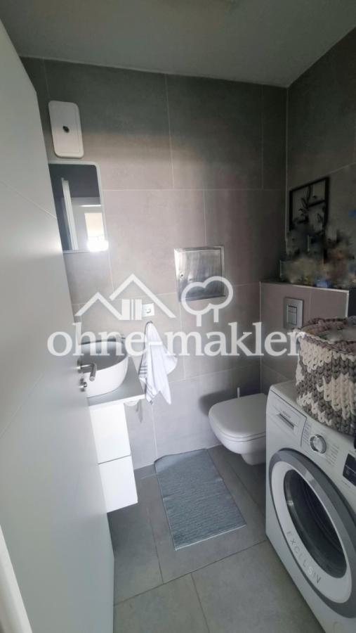 WC und Waschmaschine