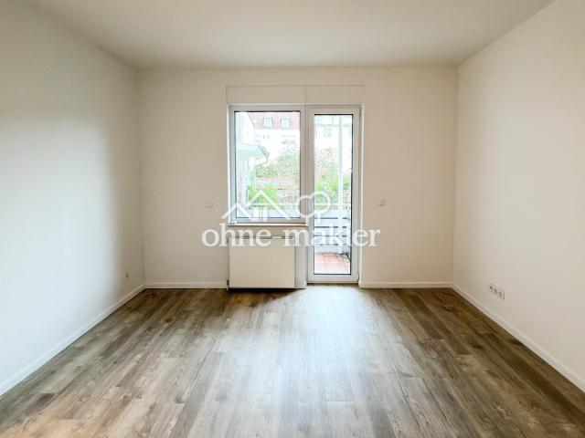 Wohnzimmer mit Balkon