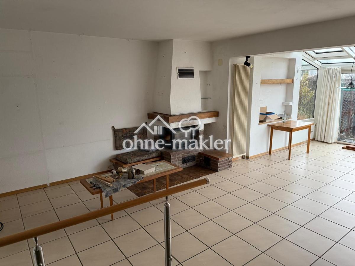 Wohnzimmer mit Kamin