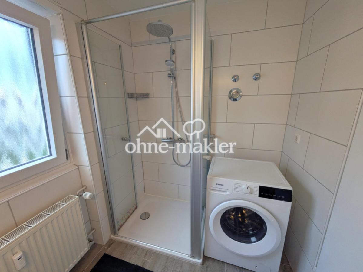 Duschbad mit Waschmaschine
