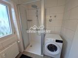 Duschbad mit Waschmaschine