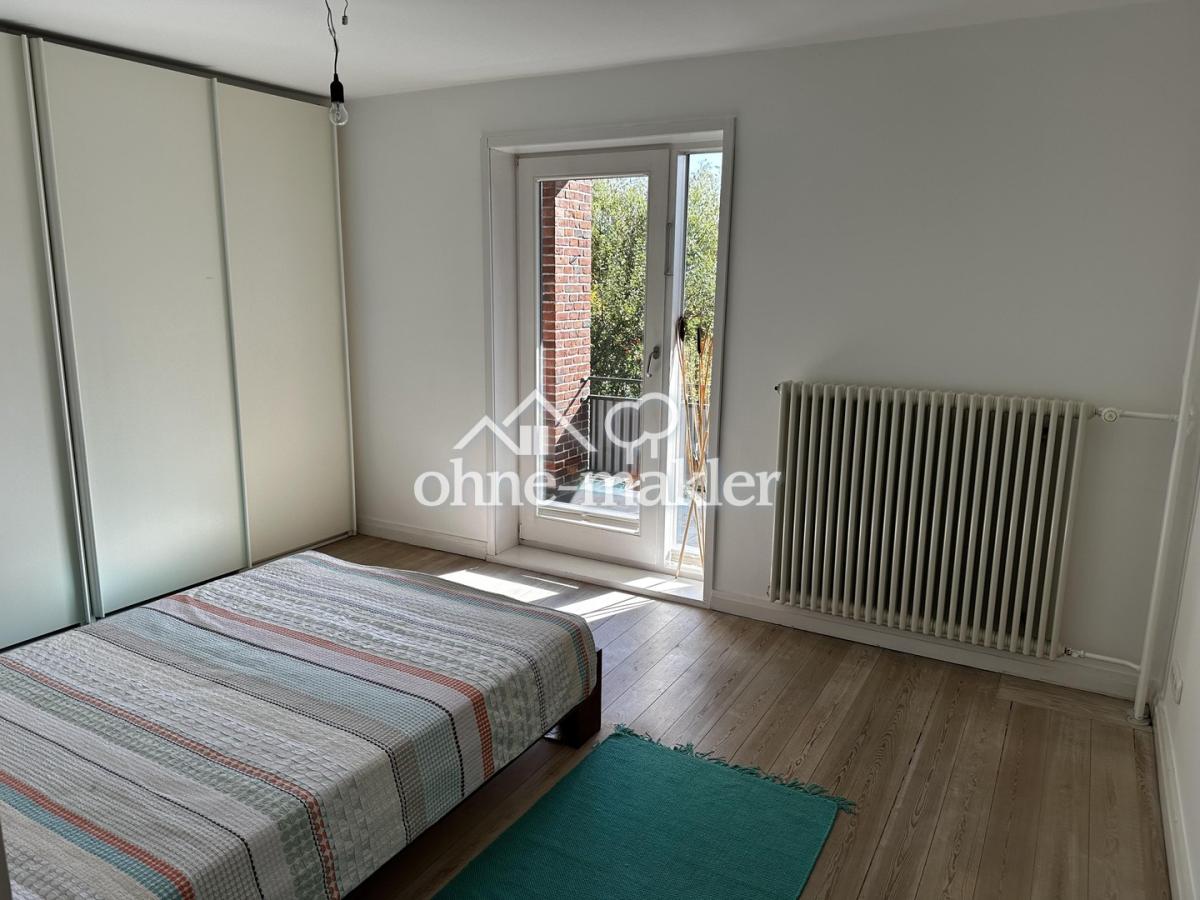 SZ OG mit Balkon + Gartenblick