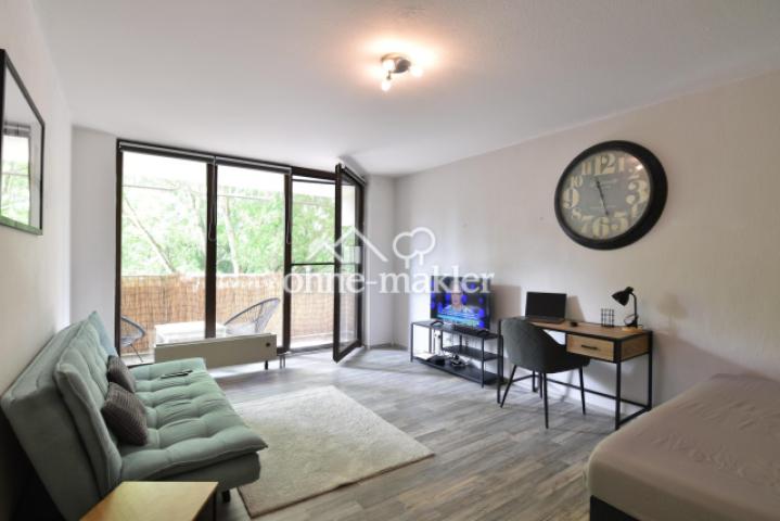 Wohnzimmer mit Balkon