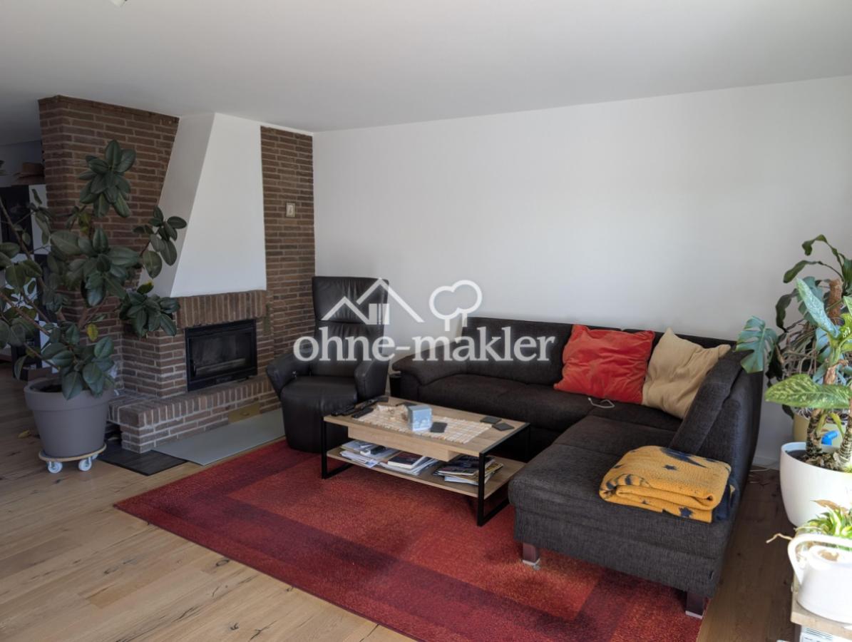 Wohnzimmer mit Kamin