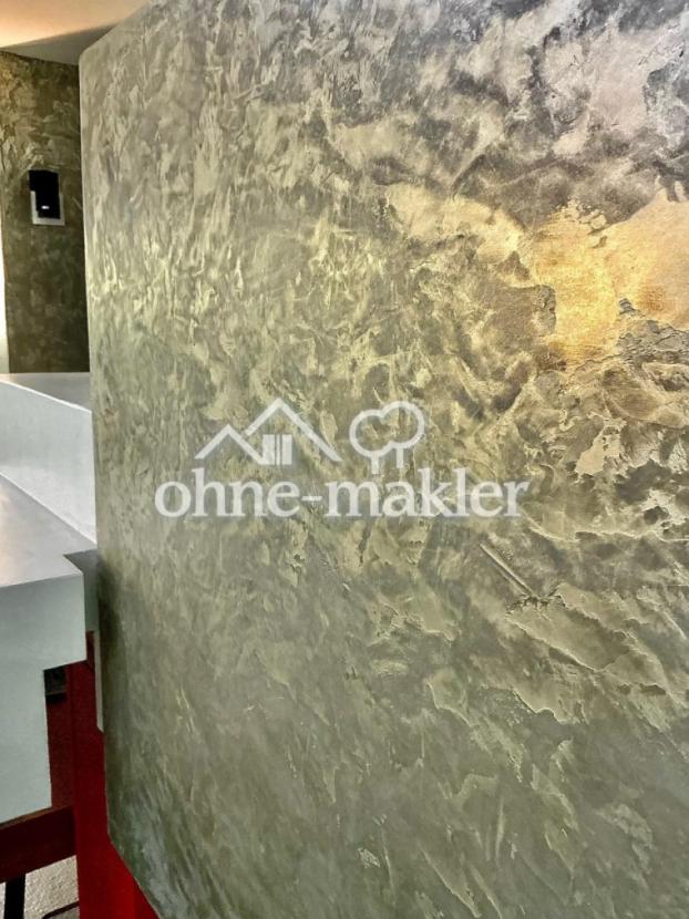 Detail Marmorwand Kamin