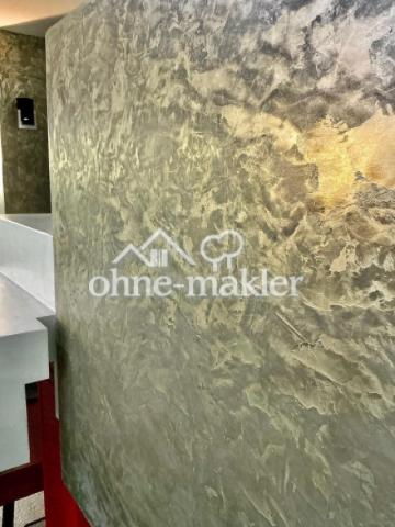 Detail Marmorwand Kamin