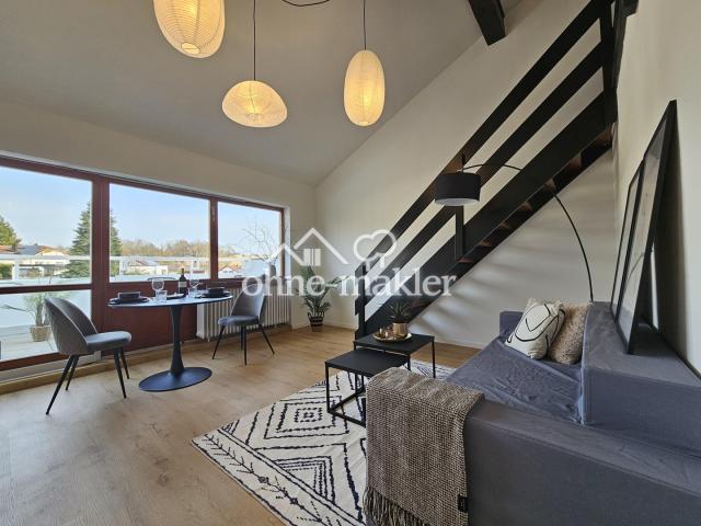 Wohnbereich mit Fensterfront