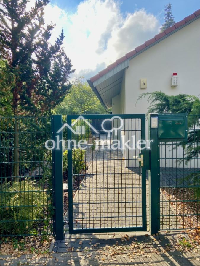 Hausseite li m. Eingangspforte