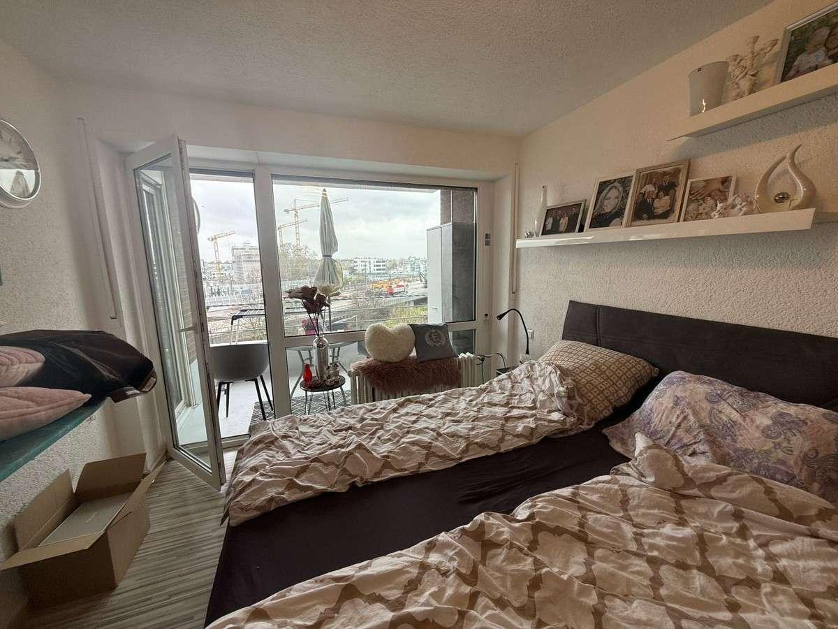 Schlafzimmer mit Balkon