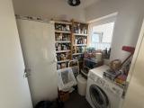 Abstellraum mit Waschmaschinenanschluss