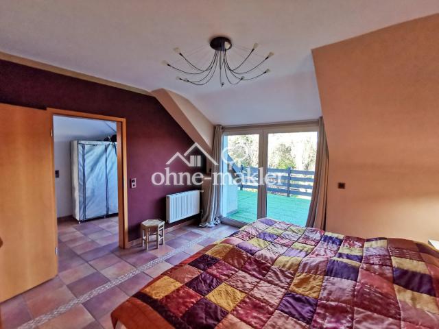 Schlafzimmer mit Dachterrasse