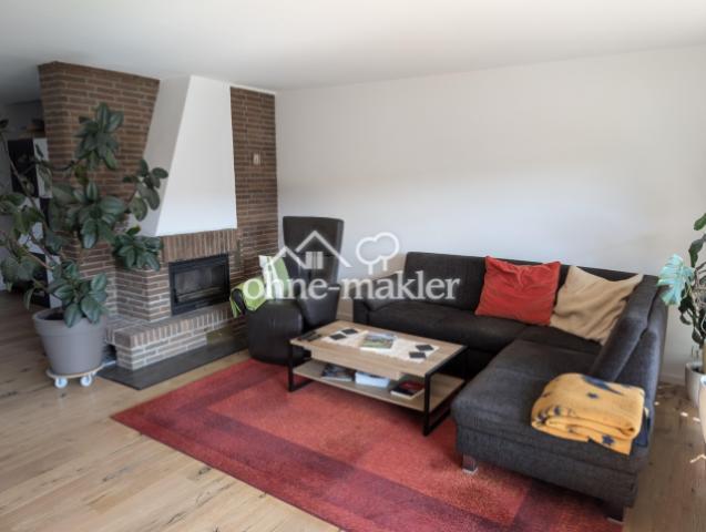 Wohnzimmer mit Kamin