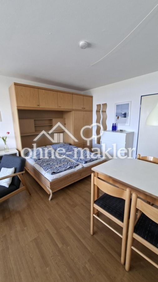 Wohnzimmer mit Wandbett