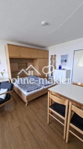 Wohnzimmer mit Wandbett