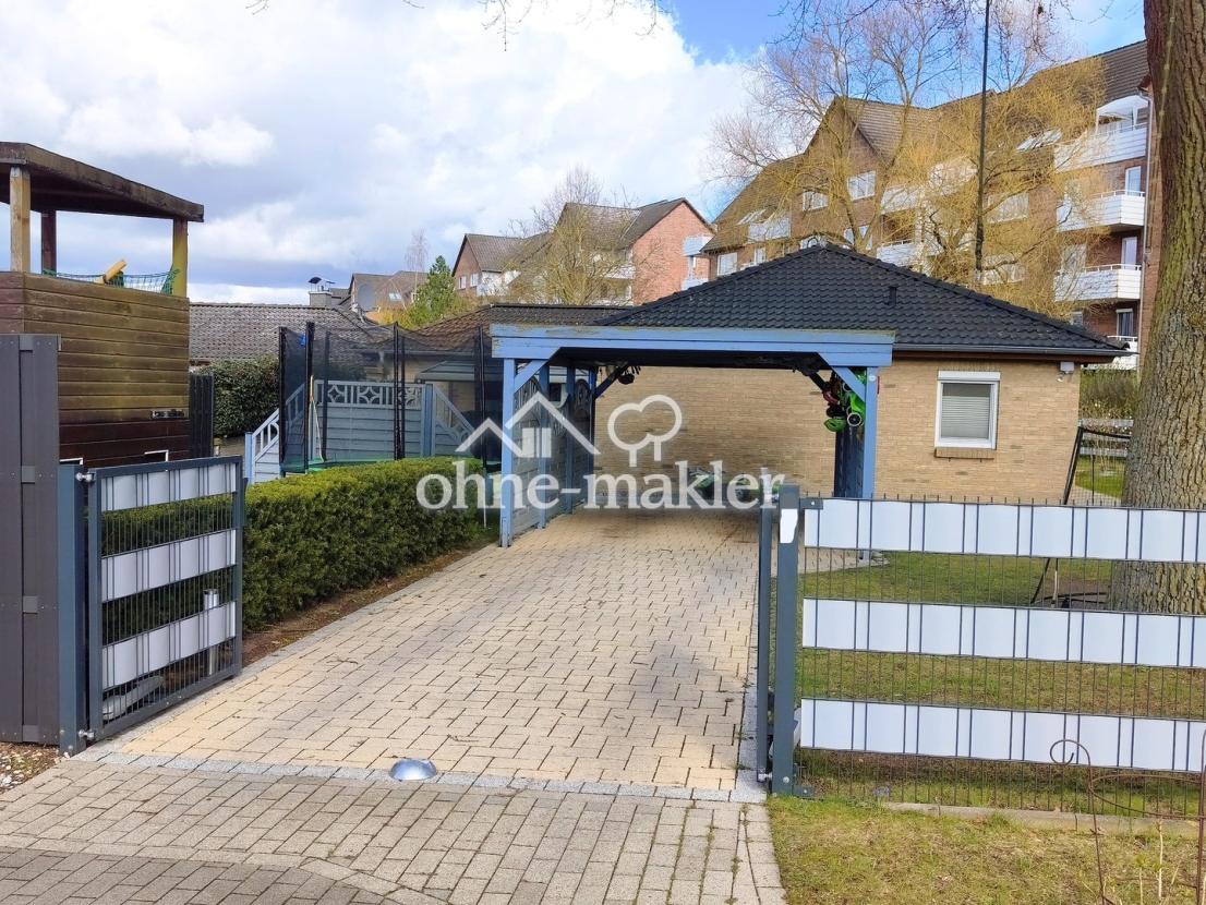 Zufahrt 1 mit Carport 