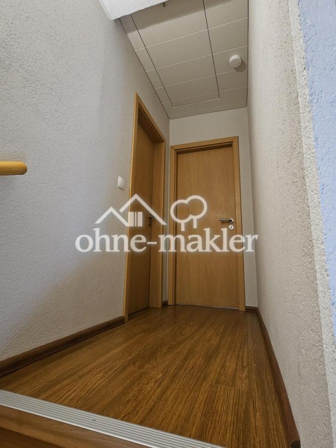 Flur mit Zugang Spitzboden DG
