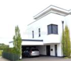 Hausansicht mit Doppelcarport