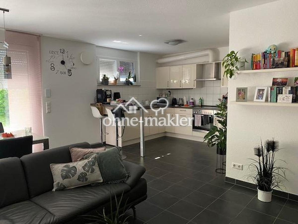 Wohnzimmer mit offener Küche 