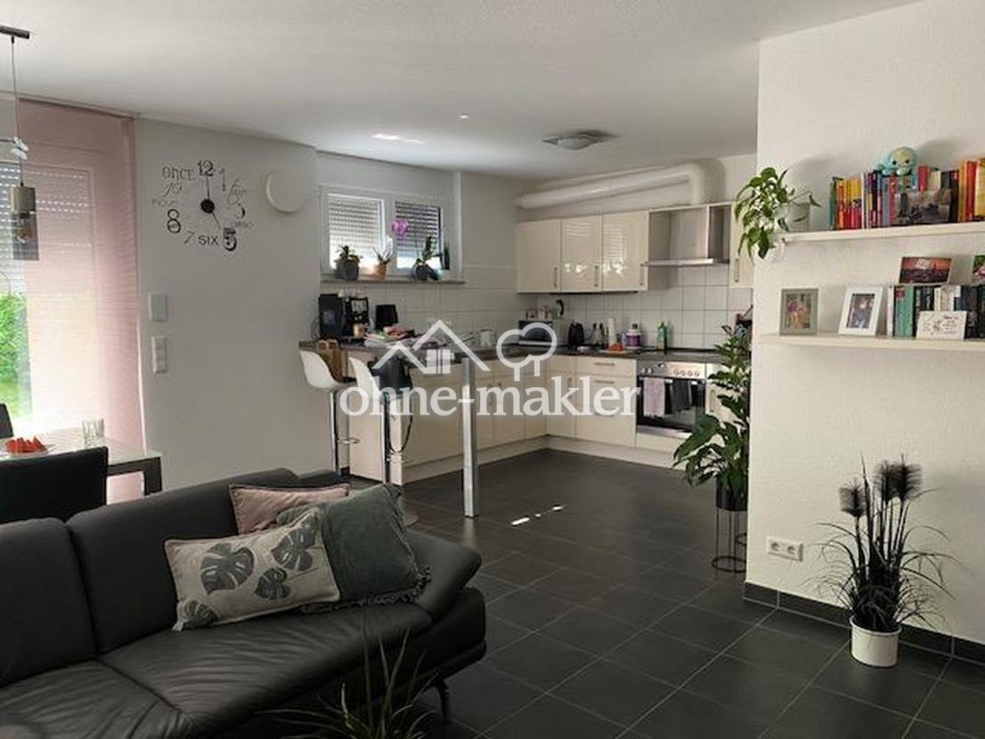 Wohnzimmer mit offener Küche 