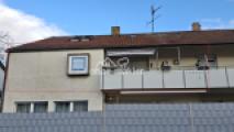 Gartenseite mit großem Balkon