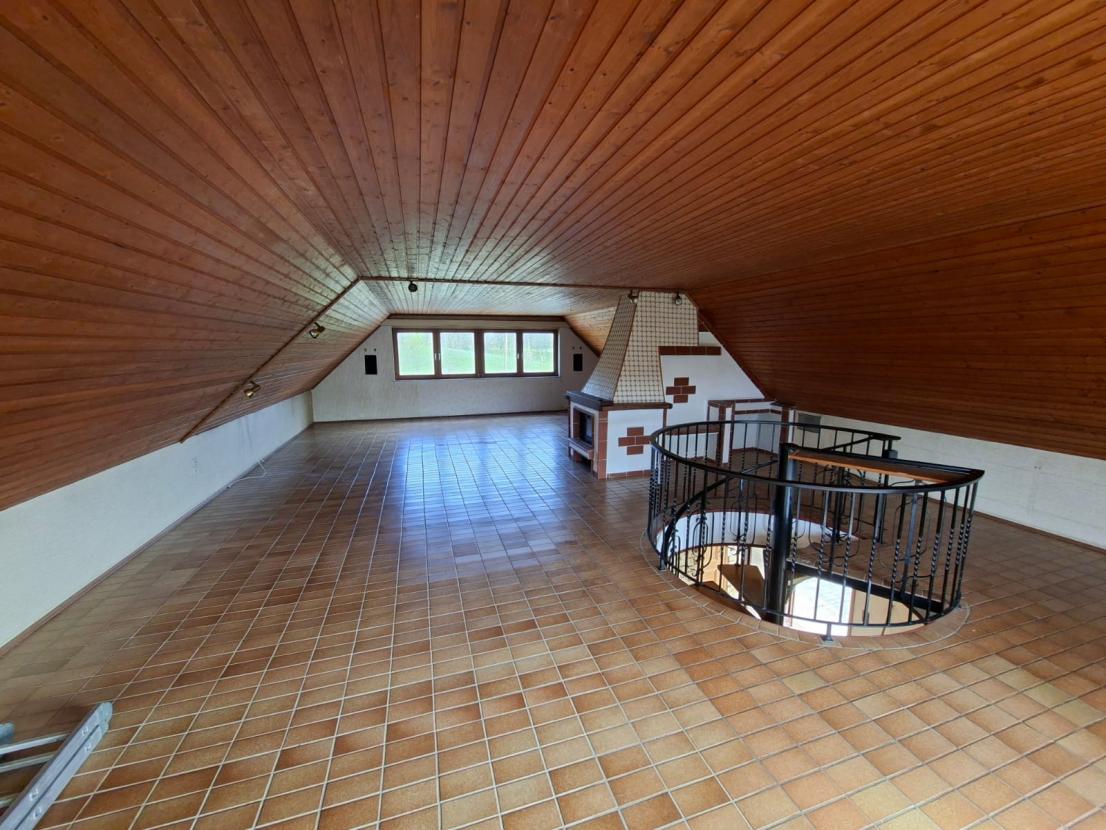Ausgebautes Dachgeschoss mit Kamin