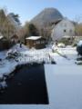 Teich, Gartenhaus im Winter