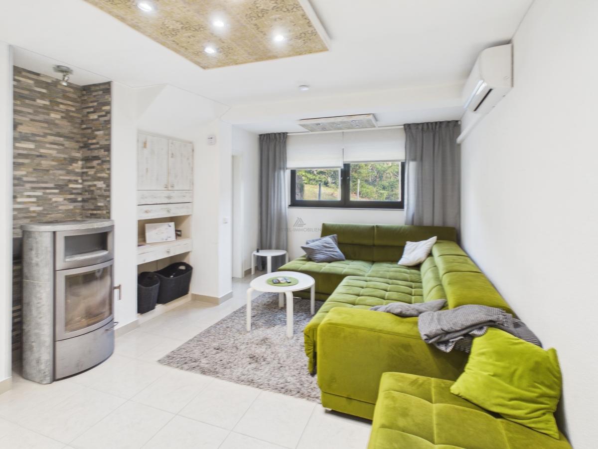 Wohnzimmer- Weyel Immobilien
