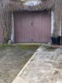 Garage mit Stellplatz davor