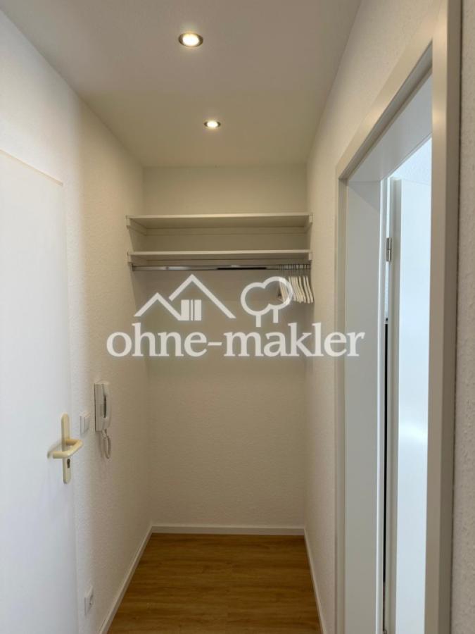 Flur mit eingebauter Garderobe