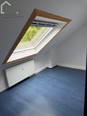 Schlafzimmer mit Dachfenster in Richtung Norden
