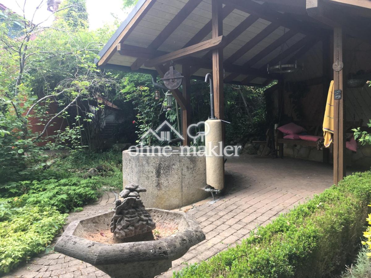 Schaukelhaus mit Außendusche