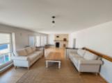 Wohnzimmer 2  mit Kamin staged