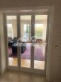 Blick v. Flur ins Wohnzimmer