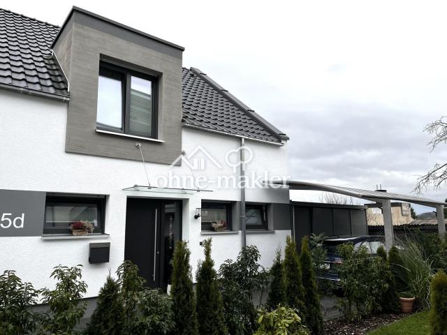 Nordansicht mit Wing-Carport