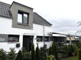 Nordansicht mit Wing-Carport