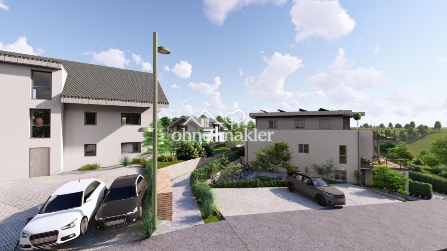 PKW-Stellplätze neben dem Haus