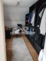 Ankleidezimmer im Schlafzimmer