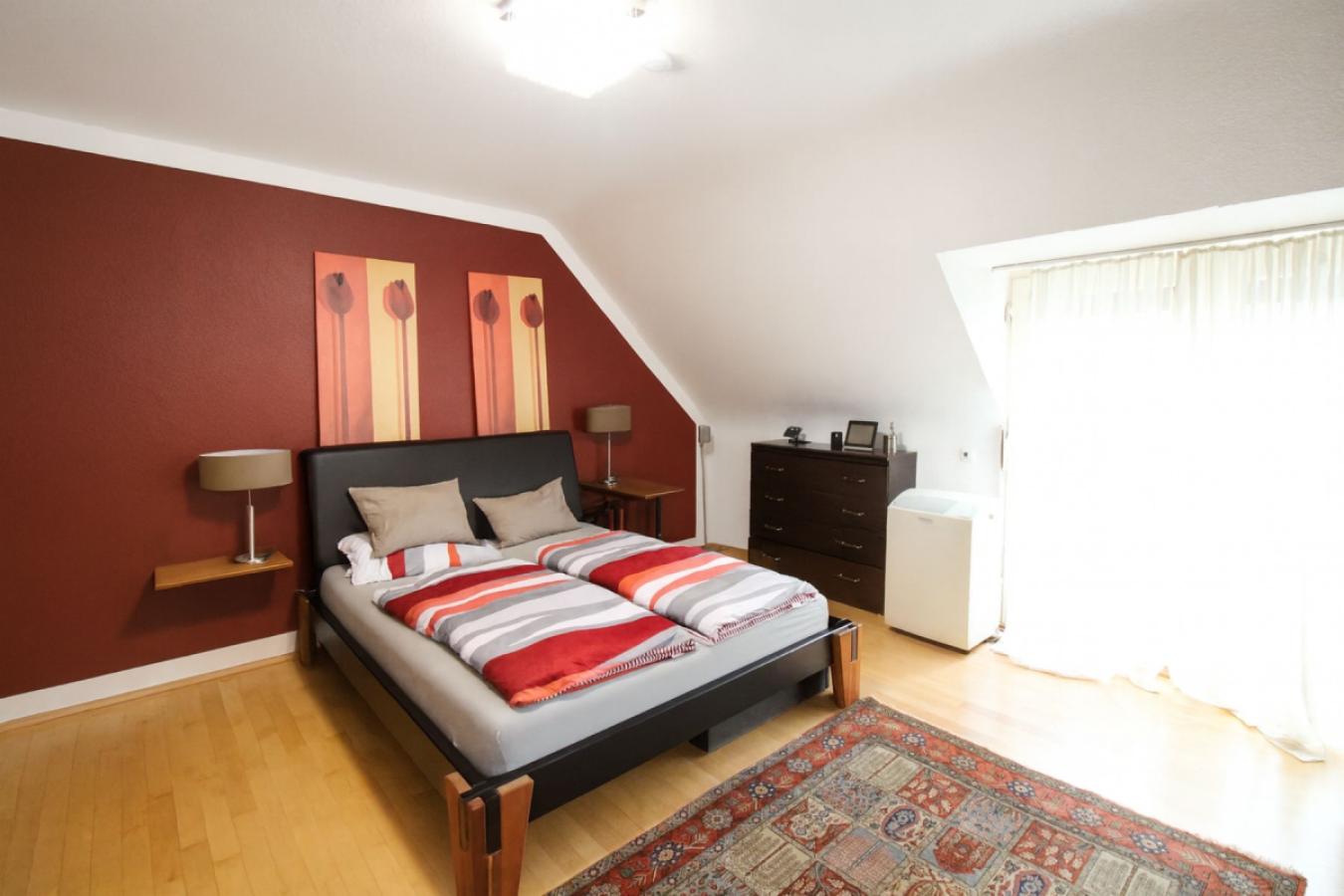 Schlafzimmer mit Balkon