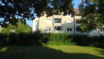 Hausansicht Garten mit Balkon
