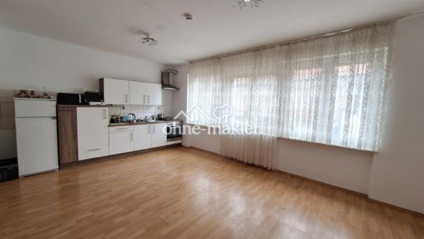 Wohnzimmer mit Küche