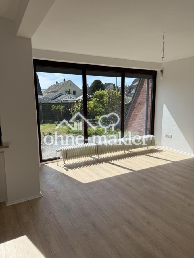 Wohnzimmer mit Gartenblick
