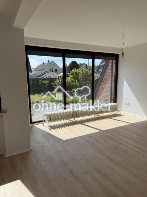 Wohnzimmer mit Gartenblick